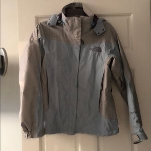 Lt Blue and Gray North Face women’s hyVent jacket